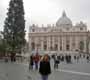 A girl poses for a photo in St Peter's Square at Christmas