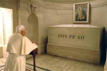 Pope Benedict XVI prays at the Tomb of Pius XII