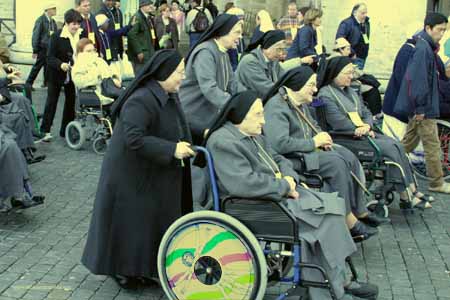 On the annual day for the Blessing of the Sick, many nuns in wheelchairs are brought into St Peter's
